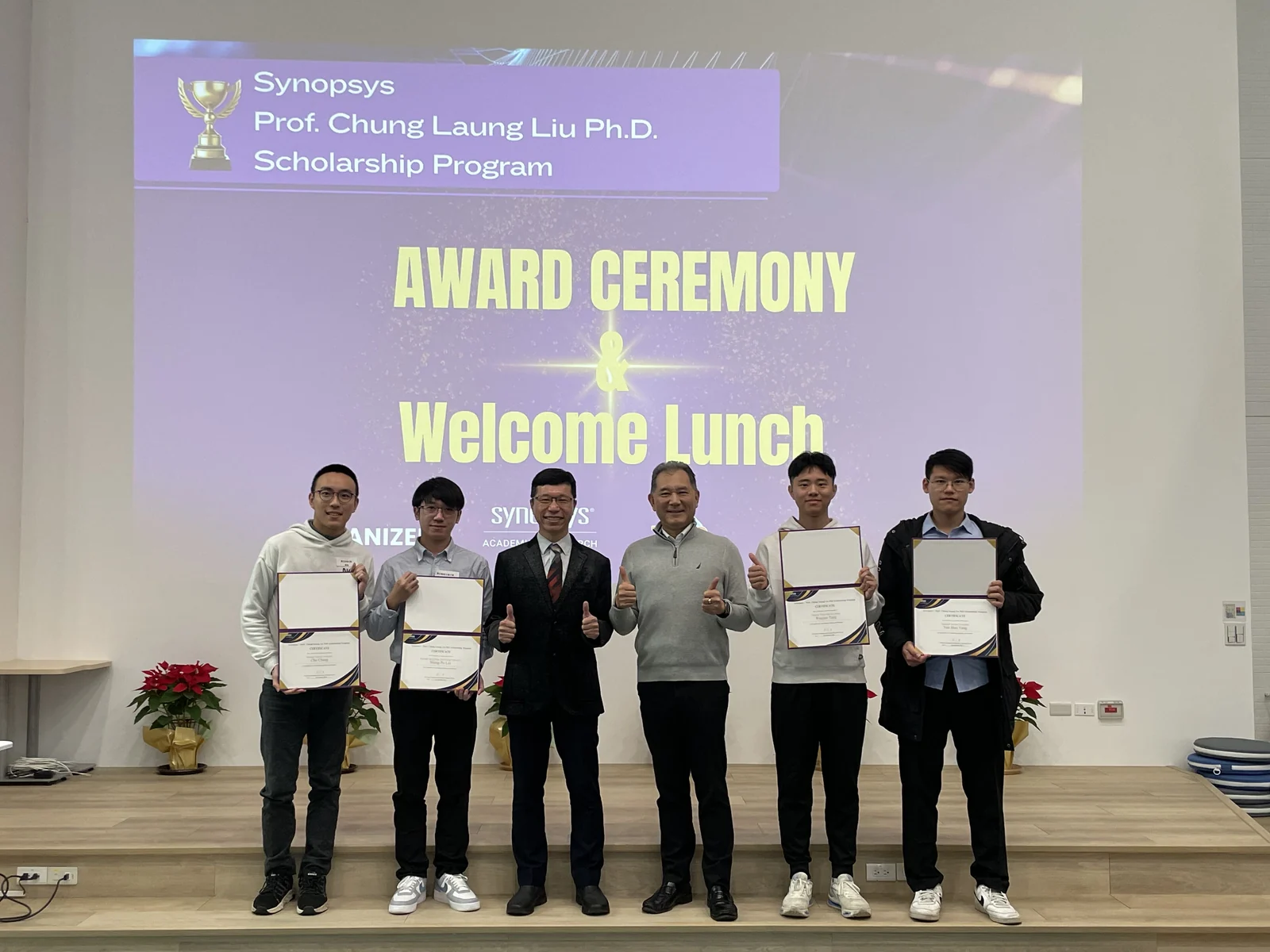 Wuqian Tang with fellow recipients holding certificates at the 2024 Synopsys Prof. Chung Laung Liu Ph.D. Scholarship ceremony.